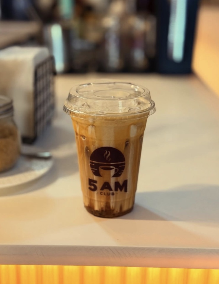 A branded iced coffee on a café counter